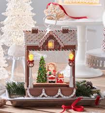 4316916 Santa Musical Lit Water Gingerbread House