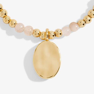 A Little "July Birthstone" Gold Bracelet